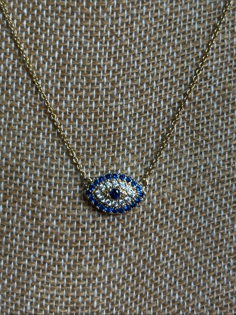 Gold Evil Eye Necklace with Blue and White Stones
